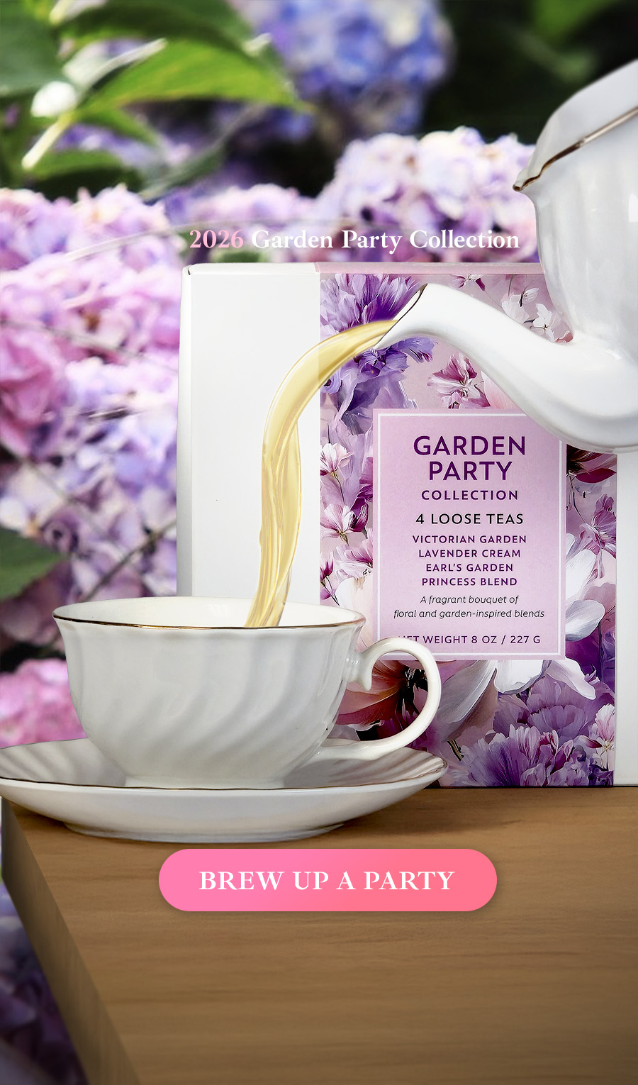 Liquid tea is poured from a teapot into a cup. Murchie's Garden Party Collection and a garden of hydrangeas are behind.