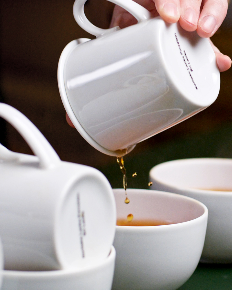 Standardized cupping technique and vessel for tasting tea